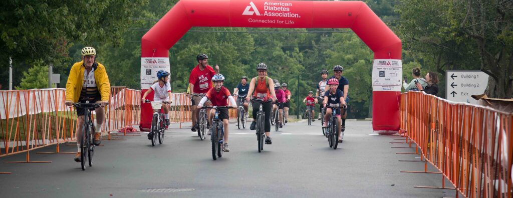 Tour de Cure finishers on bikes.